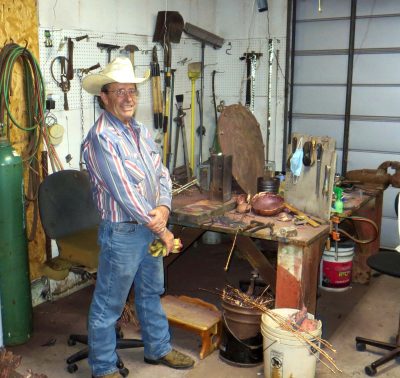 Copper artist Roy Trobaugh at work in his studio.