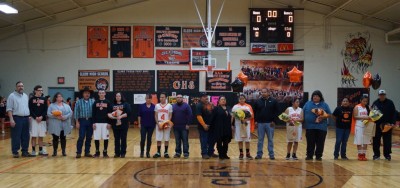 The six senior honorees with their parents before Wednesday's games.