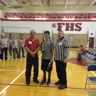 Derek Figueroa, first place, with State Hoop Shoot director, left, Greg Boyce and District Director Mike Murphy.