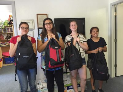 Four of Family First teens enrolled in the Ten For Teens program were awarded with filled backpacks to start the school year off. Pictured are Julia Tellez, Gianna Everette, Holly Crumley, and Makaila Clark. Great group of teens!