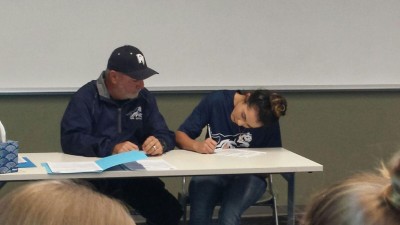 Gabby Salcido (rightt) signing her NLI with PVCC head coach Nick Candrea.
