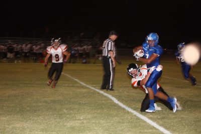 Hayden’s Brandon Cruz (#7) is pulled down by a Williams defender at Friday night’s game.