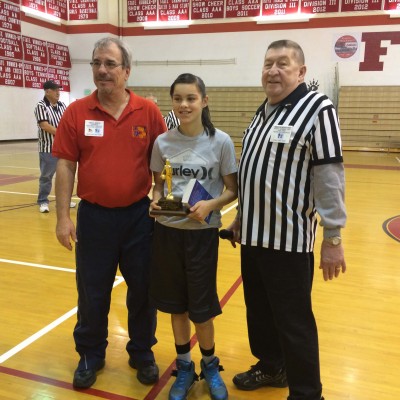 Mia Barrigan, first place, with State Hoop Shoot director, left, Greg Boyce and District Director Mike Murphy.