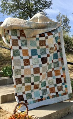A 91" x 91” batik quilt made by Suzette Thatcher will be raffled off at the breakfast.
