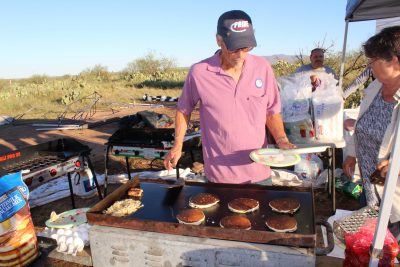 Flipping pancakes at the Quail Hunters Breakfast in Oracle Arizona.