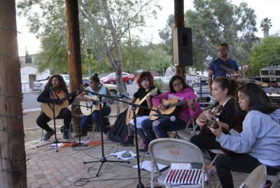 Members of the JFK Guitar Group perform at Second Friday.