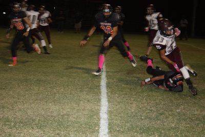 Ray freshman RB Jando Felix (33) looks for running room in Friday's game.