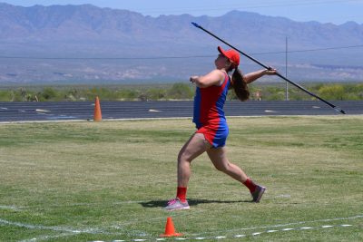 Theresa Sweeney hurls the javelin. Photo by Pacey Smith-Garcia