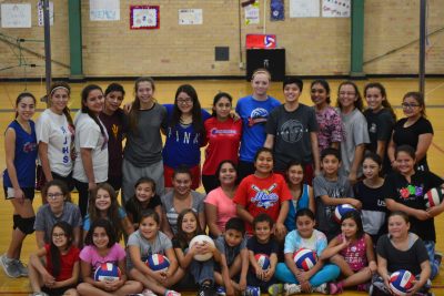 Volleyball team with the camp kids. Photo by Andrea Guerrero