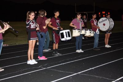 The Ray High School Marching Band entertains the crowds while officials determined where the other team was.