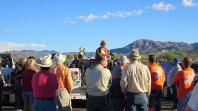 Volunteers receive instructions for the clean up in the desert near Superior Arizona. Photo courtesy Todd Pryor