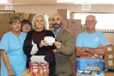 Copper Town Days Association mades donation to the Tri-Community Food Bank.